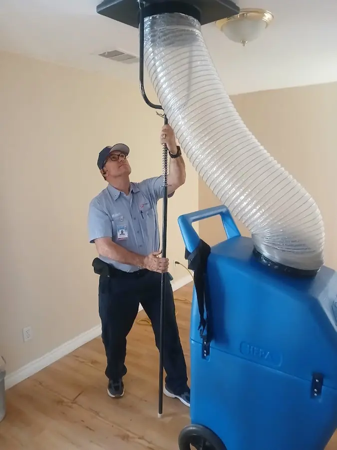 HVAC Installation technician using HEPA equipment in Highland Park